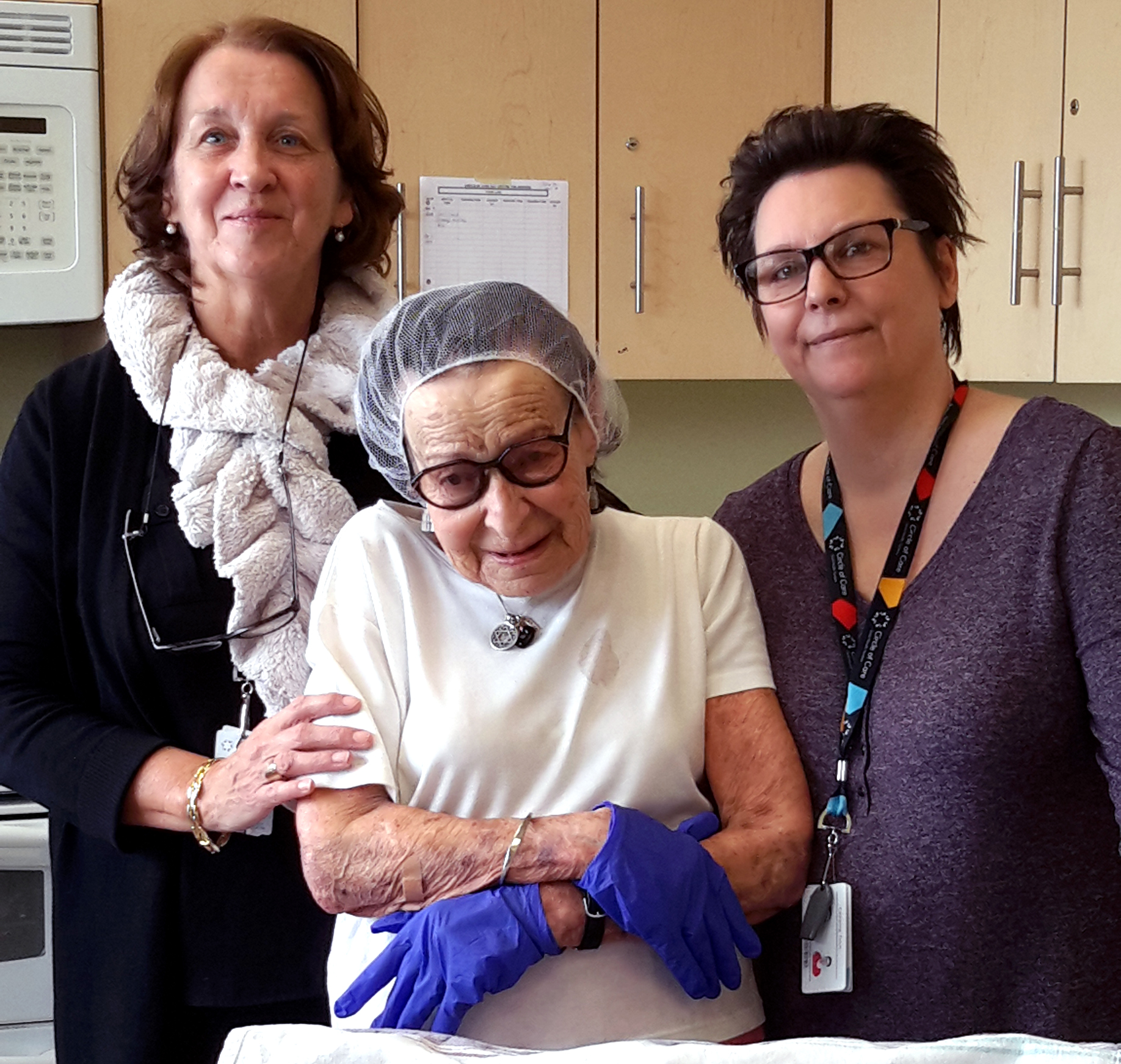 Image of Madeline, Catherine, and volunteer at Adult Day Program