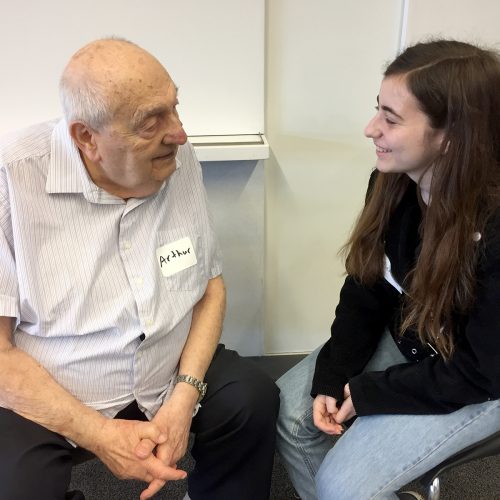 image of volunteer with Holocaust survivor