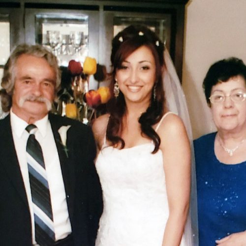 image of Angie Pacheco with parents
